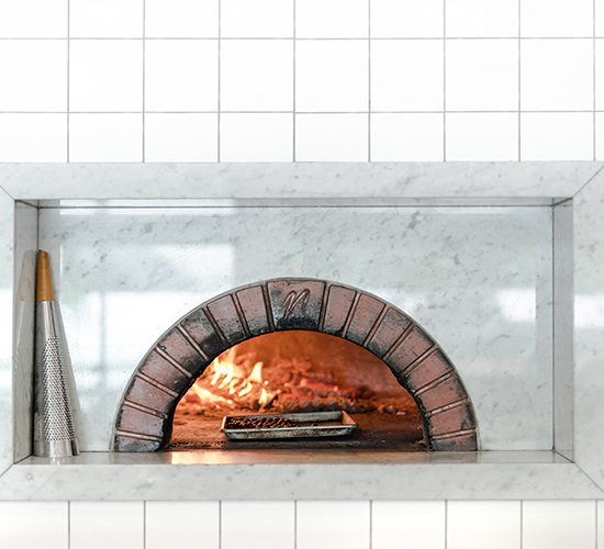 White tiled pizza oven